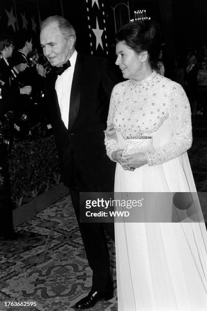James Mason and Clarissa Kaye attend an American Film Institute event at the Beverly Hilton Hotel in Beverly Hills, California, on March 3, 1983.