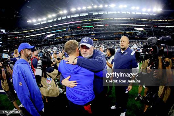 Head coach Mike McCarthy of the Dallas Cowboys and head coach Sean McVay of the Los Angeles Rams meet at midfield after a game at AT&T Stadium on...