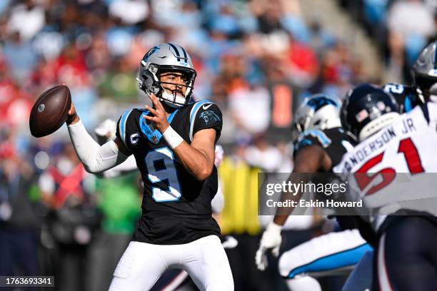 Bryce Young of the Carolina Panthers throws a pass during the fourth quarter of the game against the Houston Texans at Bank of America Stadium on...