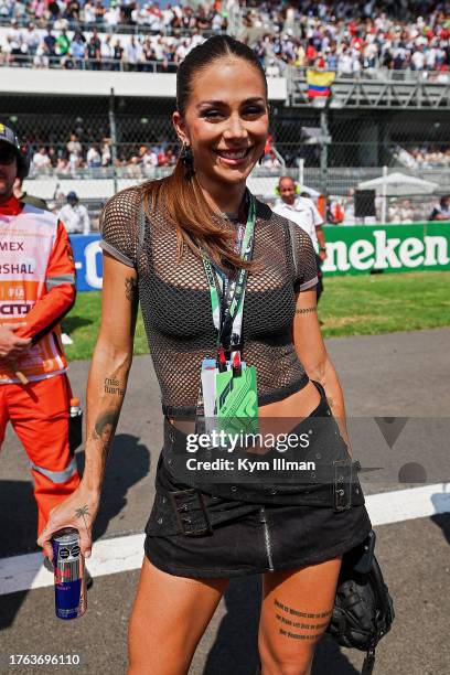 Colombian actress and singer Greeicy Rendon poses on the grid prior to the F1 Grand Prix of Mexico at Autodromo Hermanos Rodriguez on October 29,...