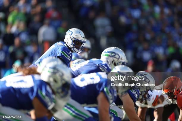 Geno Smith of the Seattle Seahawks looks on prior to taking a snap during the first quarter of a game against the Cleveland Browns at Lumen Field on...