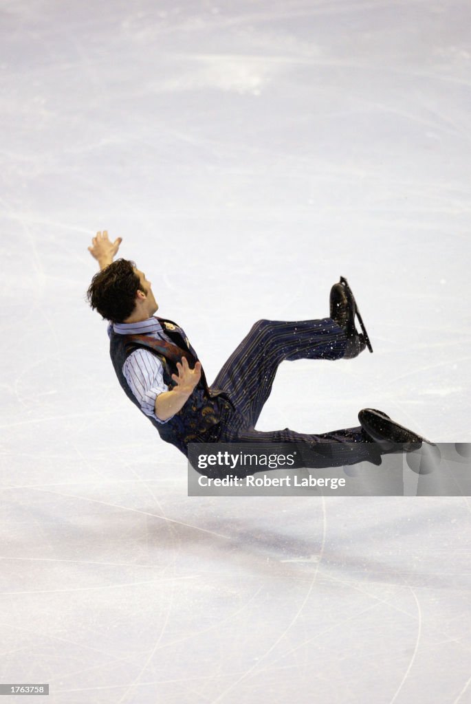 Matthew Savoie falls to the ice