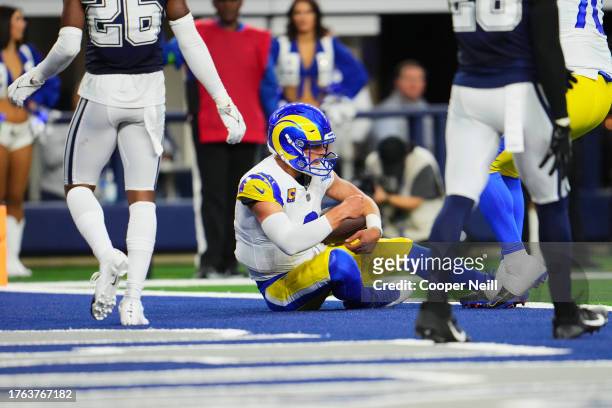 Matthew Stafford of the Los Angeles Rams catches a two point conversion against the Dallas Cowboys at AT&T Stadium on October 29, 2023 during the...