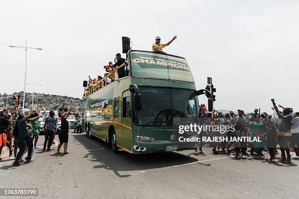 Springboks Rugby Bus South Africa's team celebrates on a bus with Springbok supporters ...