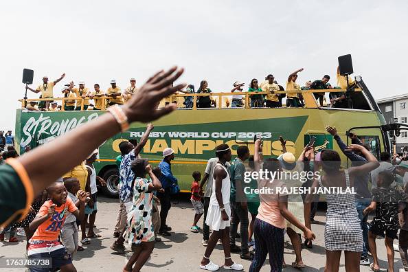 Springboks Rugby Bus South Africa's team celebrates on a bus with Springbok supporters ...