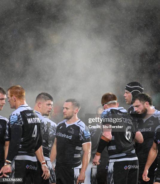 Falcons player Brett Connon and his Falcons team mates look on as the steam rises during the Gallagher Premiership Rugby match between Newcastle...