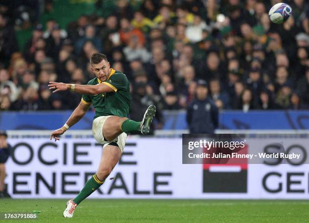 Handre Pollard of South Africa kicks a penalty during the Rugby World Cup Final match between New Zealand and South Africa at Stade de France on...