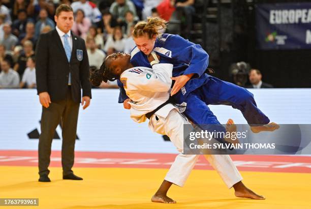 France's Clarisse Agbegnenou throws Finland's Emilia Kanerva to make an ippon during the women's under 63 kg during the European Judo Championships...