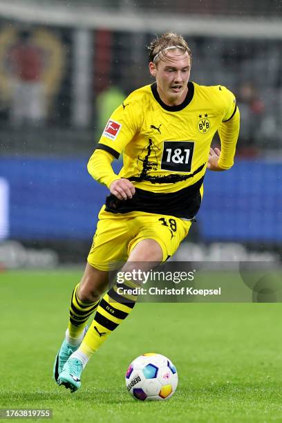 Julian Brandt of Dortmund runs with the ball during the Bundesliga match between Eintracht Frankfurt and Borussia Dortmund at Deutsche Bank Park on...