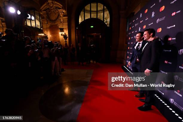 Former New Zealand All Blacks players Conrad Smith and Richie McCaw pose for a photograph on the Red Carpet as he arrives at the World Rugby Awards...
