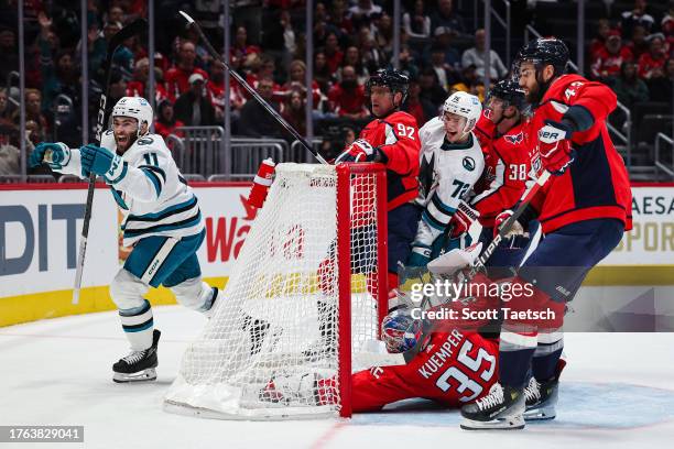 Luke Kunin of the San Jose Sharks celebrates after scoring a goal against Darcy Kuemper of the Washington Capitals during the first period of the...