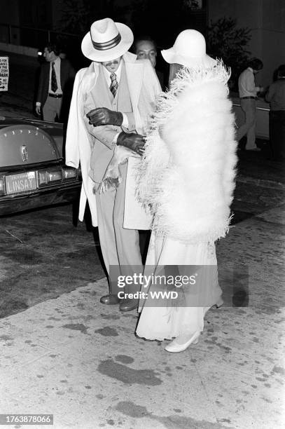 Peter Fonda and Portia Rebecca Crockett attend a party at Art Laboe's Club in Hollywood, California, on November 21, 1975.