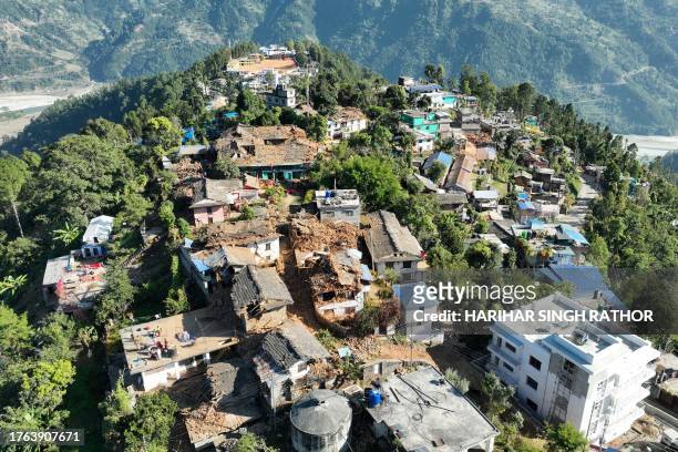 An aerial picture shows damaged buildings in Jajarkot district on November 4 following an overnight 5.6-magnitude earthquake. At least 132 people...