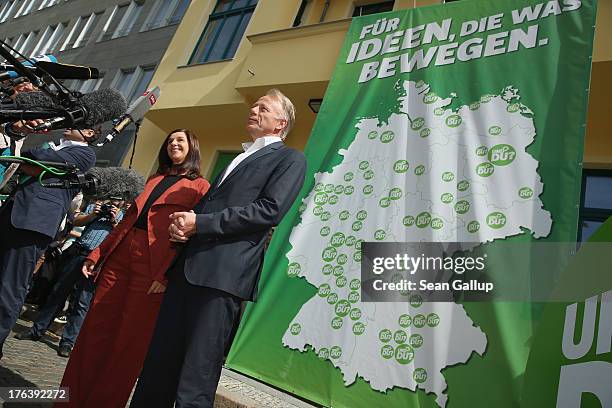 Lead candidates of the German Greens Party Juergen Trittin and Katrin Goering-Eckardt speak to the media shortly before departing on their federal...