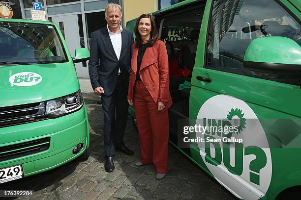 Lead candidates of the German Greens Party Juergen Trittin and Katrin Goering-Eckardt pose for the media shortly before departing on their federal...