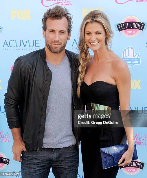 Player Jarret Stoll and TV personality Erin Andrews arrive at the 2013 Teen Choice Awards at Gibson Amphitheatre on August 11, 2013 in Universal...