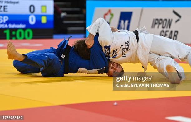 Azerbaijan's Hidayat Heydarov and Spain's Salvador Cases Roca compete in the men's under 73 kg final during the European Judo Championships 2023 at...