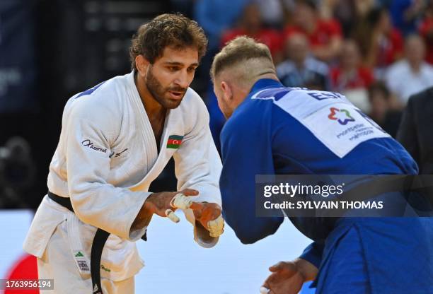 Azerbaijan's Hidayat Heydarov and Spain's Salvador Cases Roca compete in the men's under 73 kg final during the European Judo Championships 2023 at...