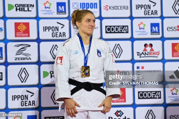 Slovenia's Andreja Leski poses with her gold medal in the women's under 63 during the European Judo Championships 2023 at the Sud de France Arena in...