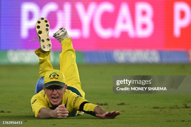 Australia's Adam Zampa takes the catch to dismiss England's David Willey during the 2023 ICC Men's Cricket World Cup one-day international match...