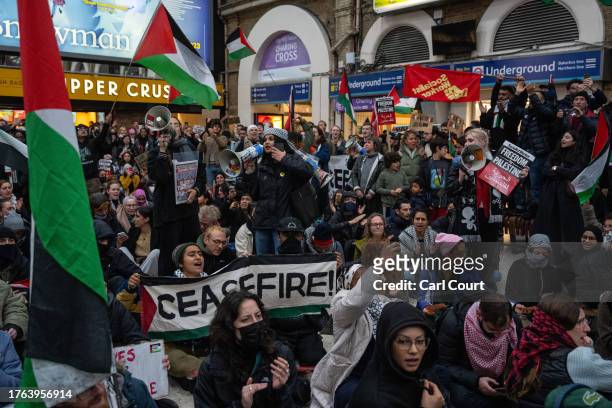 People stage a sit-in inside Charing Cross train station during a pro-Palestinian demonstration on November 4, 2023 in London, United Kingdom. The...