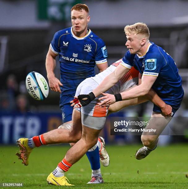 Dublin , Ireland - 4 November 2023; Jamie Osborne of Leinster offloads as he is tackled by James Lang of Edinburgh during the United Rugby...