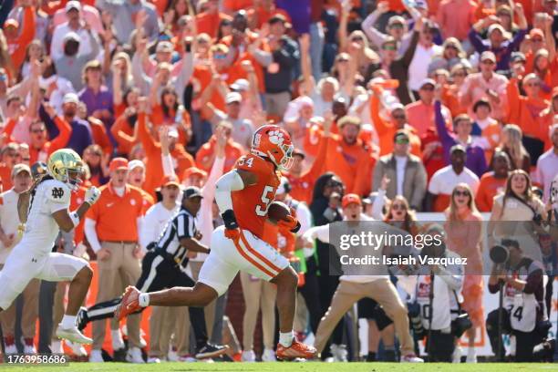 Jeremiah Trotter Jr. #54 of the Clemson Tigers intercepts the ball against the Notre Dame Fighting Irish during the second quarter for a touchdown at...