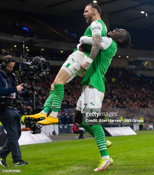 Hibernian's Martin Boyle celebrates with Elie Youan after scoring but his goal is ruled out for offside by VAR during a Viaplay Cup semi-final match...