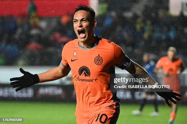 Inter Milan's Argentine forward Lautaro Martinez celebrates after scoring the team's second goal during the Italian Serie A football match between...