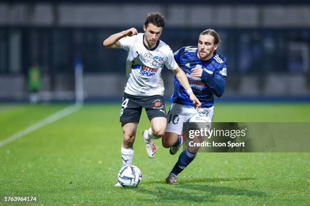 Sebastien CORCHIA of Amiens and Julien ANZIANI of Dunkerque during the Ligue 2 BKT match between Union Sportive du Littoral de Dunkerque and Amiens...