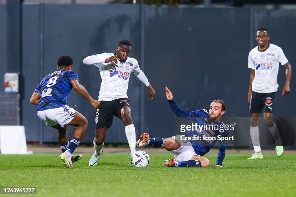 Mamadou FOFANA of Amiens and Julien ANZIANI of Dunkerque during the Ligue 2 BKT match between Union Sportive du Littoral de Dunkerque and Amiens...