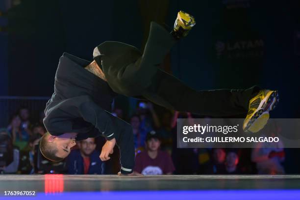 Chile's Matita competes in the B-Boys semifinals breaking event of the Pan American Games Santiago 2023 at the Chimkowe Gymnasium in Santiago on...