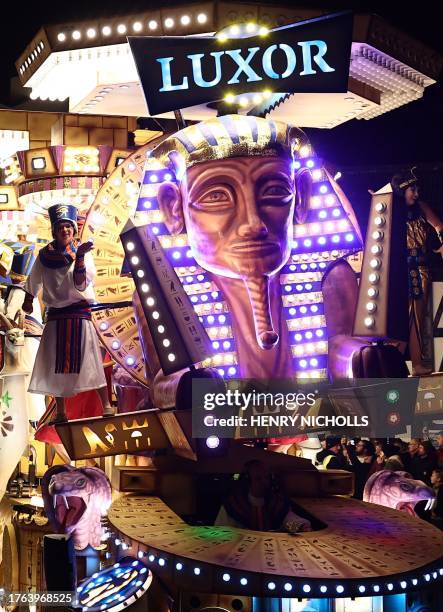 Revellers on floats entertain the crowds as they take part in the Procession through the town during the Bridgwater Guy Fawkes Carnival in south-west...