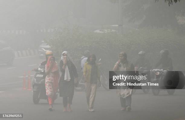 Thick smog engulfed India's capital New Delhi on Saturday as air pollution worsened with the setting of winter, shooting up concentrations of fine...