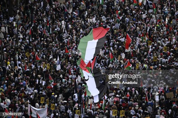 Protestors gather to hold a pro-Palestinian rally at the Freedom Plaza and condemn the Israeli attacks on Gaza, in Washington D.C., United States on...