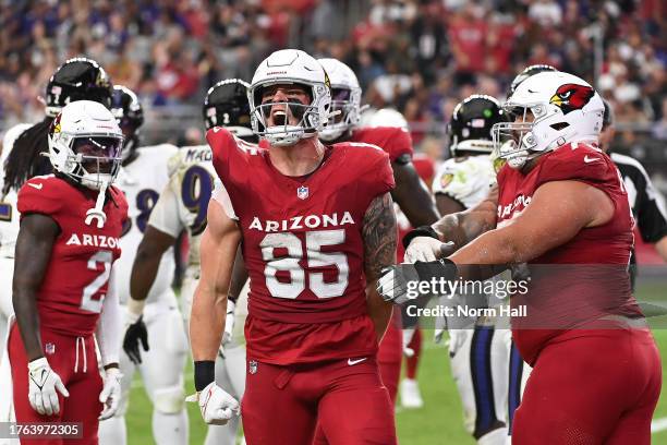 Trey McBride of the Arizona Cardinals celebrates after a receiving touchdown during the fourth quarter against the Baltimore Ravens at State Farm...