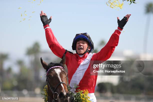 Jockey Lanfranco Dettori celebrates while he rides Inspiral after winning the Breeders Cup Filly & Mare Turf at Santa Anita Park on November 4, 2023...