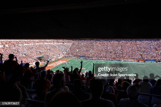 Texas Longhorns fans cheer for their team during the game between the Texas Longhorns and the Kansas State Wildcats on November 4, 2023 at Darrell K...