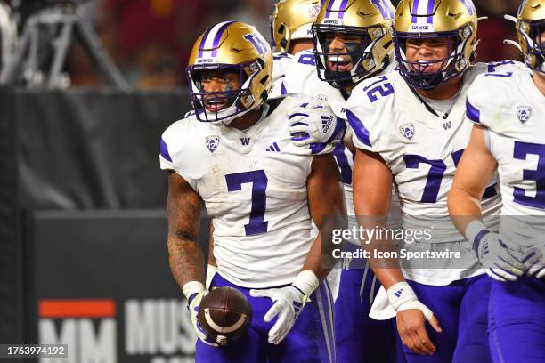 Washington Huskies running back Dillon Johnson celebrates after a touchdown during a college football game between the Washington Huskies and the USC...