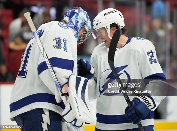 Brayden Point of the Tampa Bay Lightning congratulates his goalie Jonas Johansson after their teams' 6-4 against the Ottawa Senators at Canadian Tire...