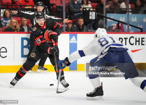 Drake Batherson of the Ottawa Senators controls the puck against Erik Cernak of the Tampa Bay Lightning at Canadian Tire Centre on November 4, 2023...
