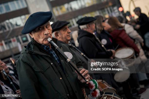 Group of Txistularis perform during the demonstration. More than 70,000 people rallied through the streets of Bilbao, Spain, to protest against a...