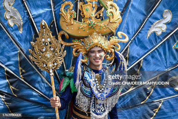 Participant parades in a carnival as part of Aceh Cultural Week in Banda Aceh on November 5, 2023.