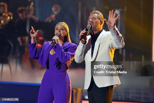 Beatrice Egli and Sascha Schmitz aka Sasha during Die Beatrice Egli Show" at Studio Berlin Adlershof on October 10, 2023 in Berlin, Germany.