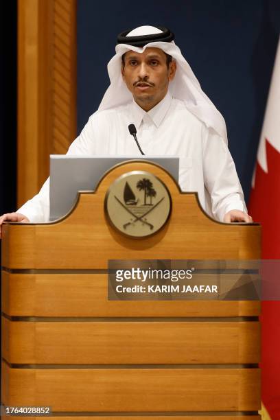 Qatari Foreign Minister Mohammed bin Abdulrahman bin Jassim al-Thani speaks during a joint press conference with his French counterpart following...