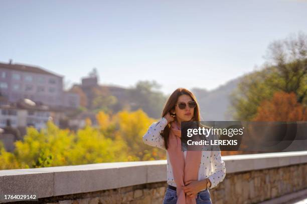 autumn portrait of a young woman - lerexis stockfoto's en -beelden