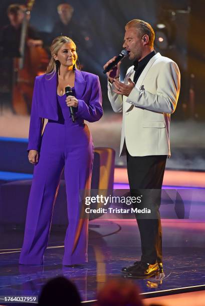 Beatrice Egli and Sascha Schmitz aka Sasha during Die Beatrice Egli Show" at Studio Berlin Adlershof on October 10, 2023 in Berlin, Germany.