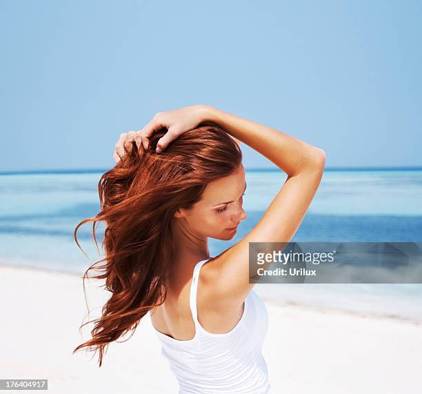 summer beauty with radiant protection for hair and skin - strand of human hair stock pictures, royalty-free photos & images