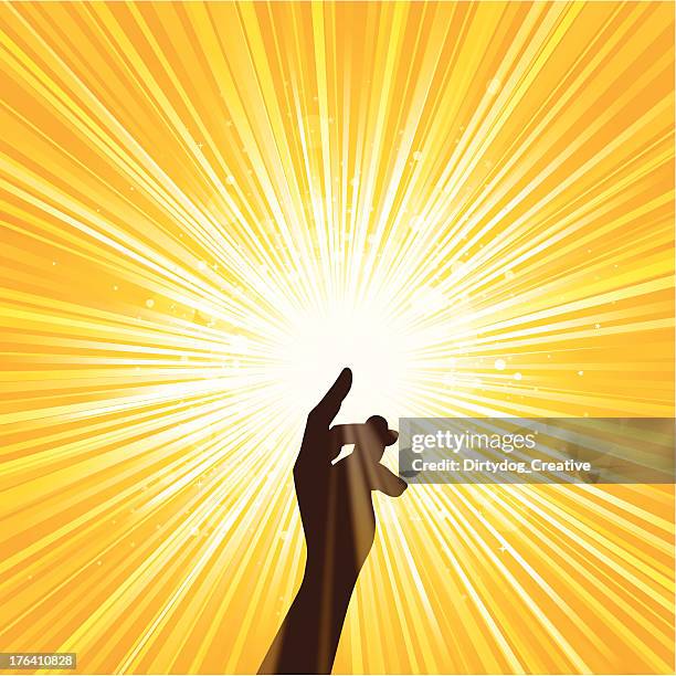 image of hand spreading yellow light - epiphany stock illustrations