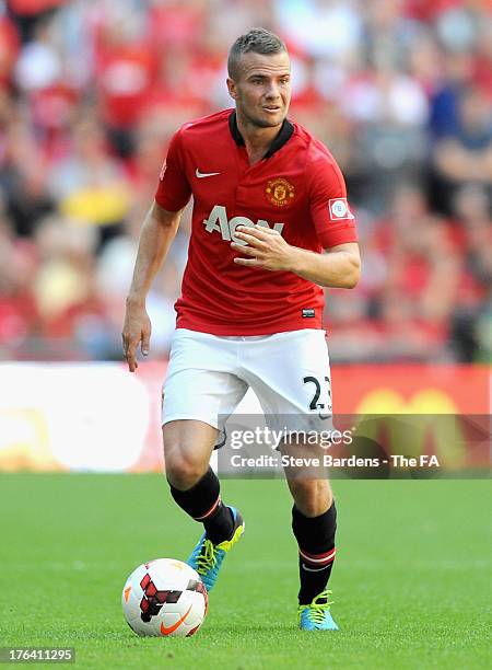 Tom Cleverley of Manchester United with the ball during the FA Community Shield match between Manchester United and Wigan Athletic at Wembley Stadium...